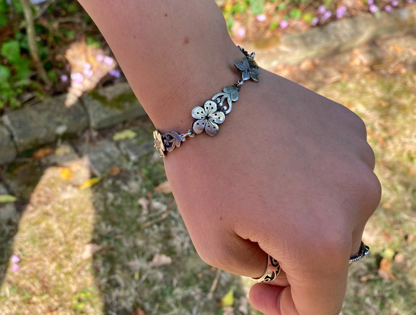 flower bracelet made from recycled sterling silver coins