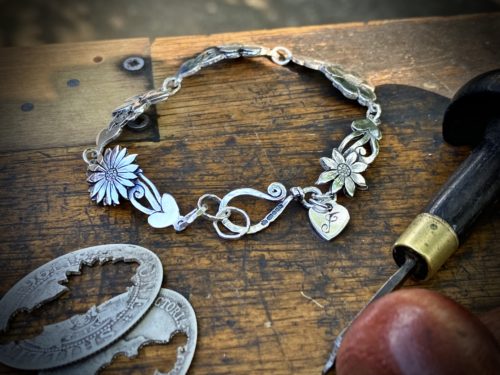 flower bracelet made from recycled sterling silver coins