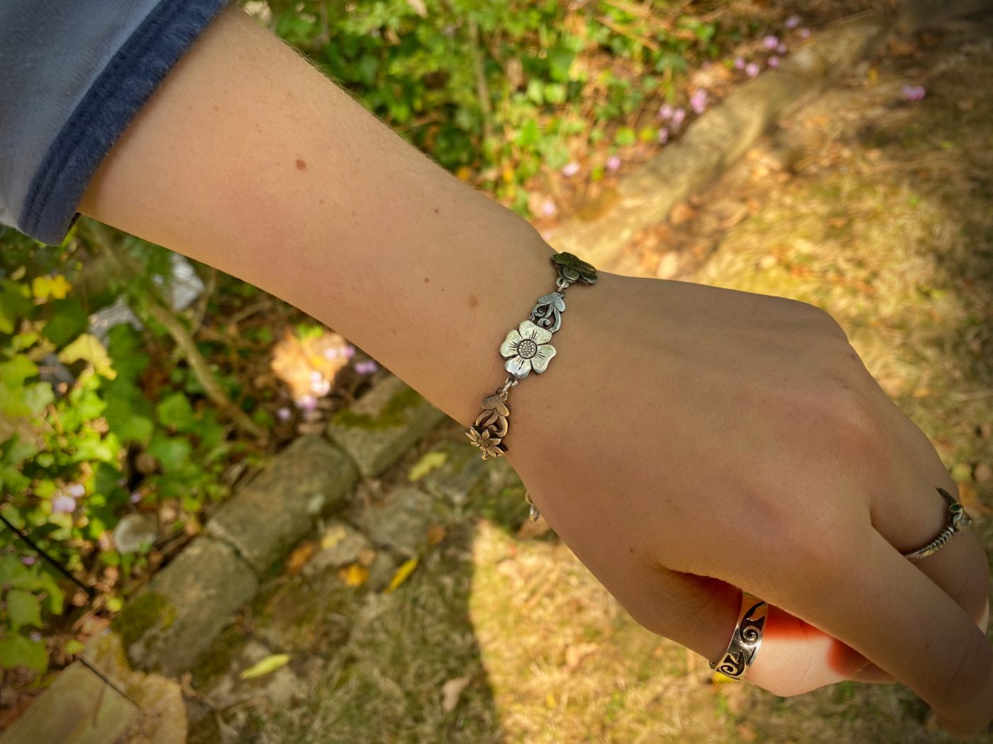 flower bracelet made from recycled sterling silver coins