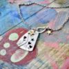 handcrafted and recycled spoon love grows necklace