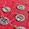 handcrafted and recycled silver threepence coin yoga earrings