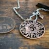 Handcrafted and recycled coin sun and om pendant necklace