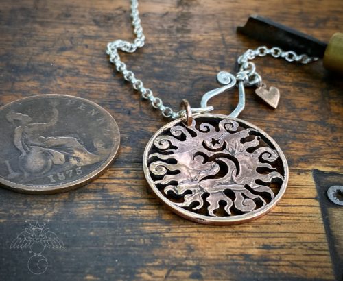 Handcrafted and recycled coin sun and om pendant necklace