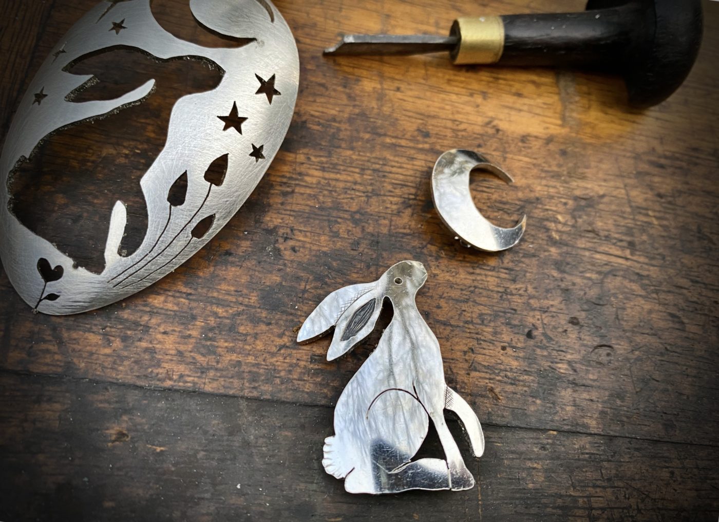 moon gazing hare brooch made from upcycled flatware, repurposed spoons, cutlery by hairy growler jewellery