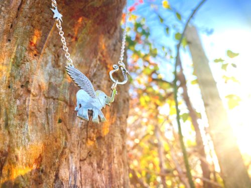 Handcrafted and recycled sterling silver flying-pig necklace