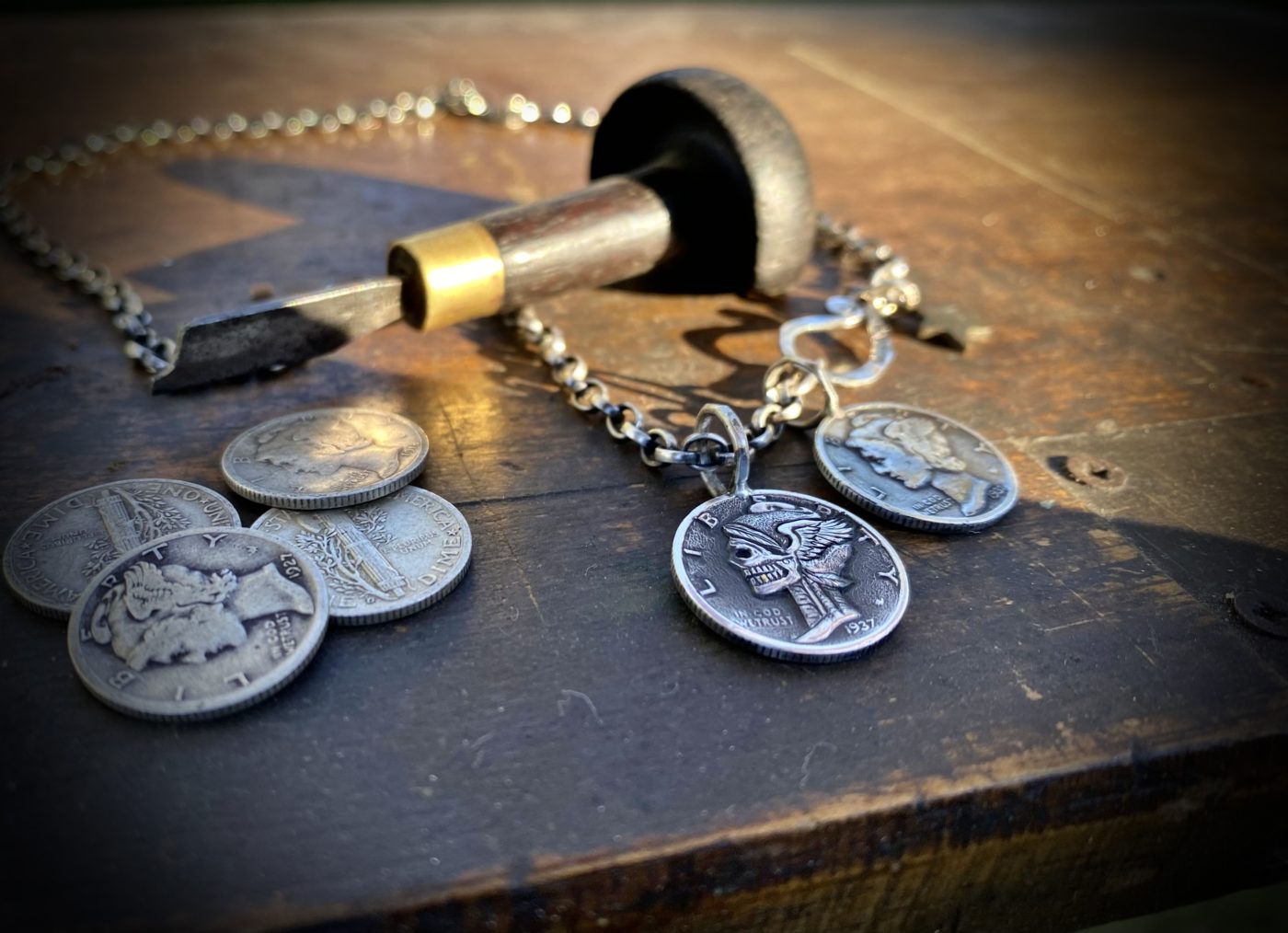 Hand-carved and recycled silver dime liberty coin skull necklace