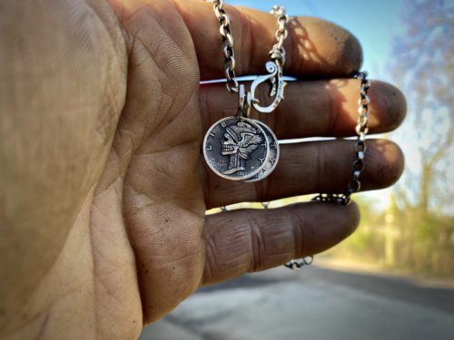 Hand-carved and recycled silver dime liberty coin skull necklace