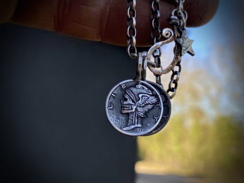 Hand-carved and recycled silver dime liberty coin skull necklace