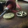 Handcrafted and recycled om coin pendant necklace