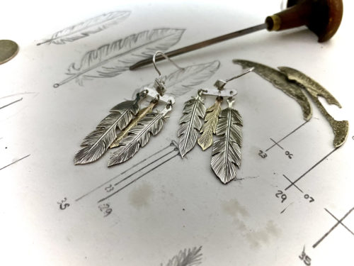 dream seeker feather earrings made from silver coins