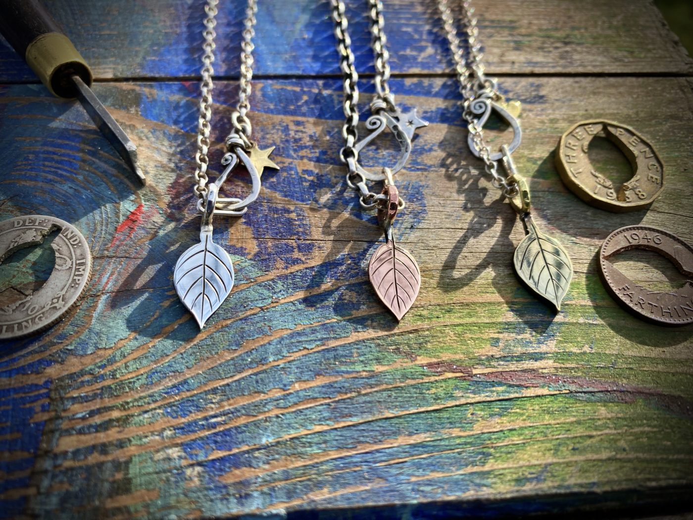 Apple tree leaves necklace ethical jewellery made from recycled silver coins.