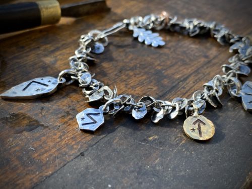 ancient viking rune symbol jewellery handmade in England using traditional tools and techniques